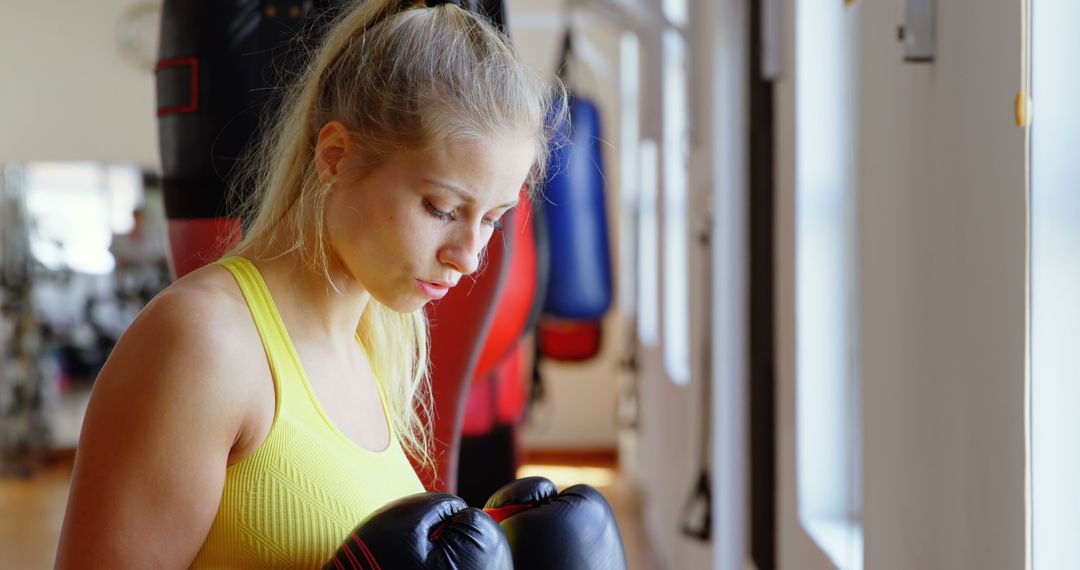 Female Boxer Preparing for Training in Gym - Free Images, Stock Photos and Pictures on Pikwizard.com