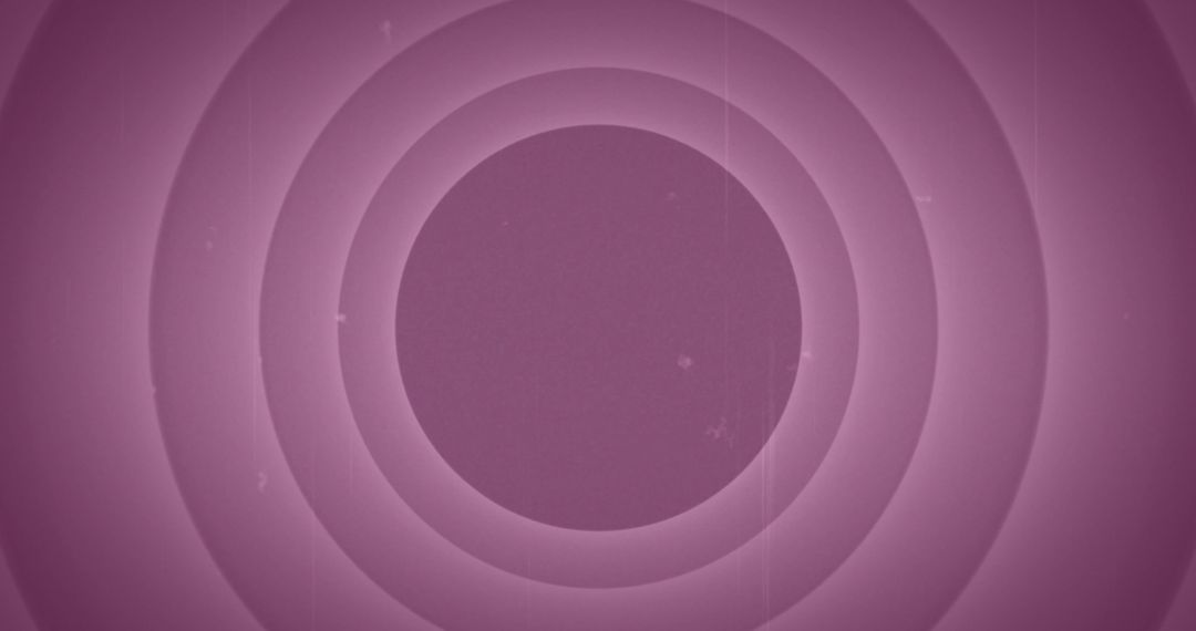 Concentric Pink Circles on Textured Background