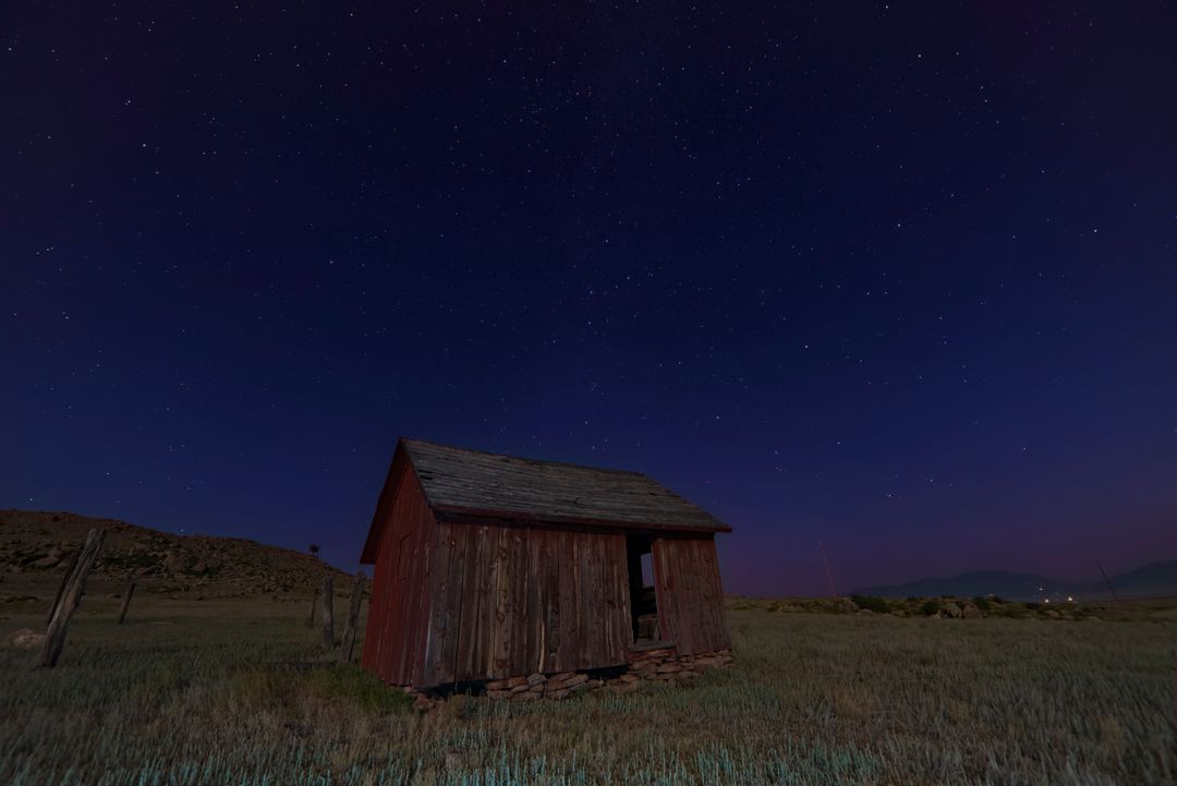 Old wooden shack in countryside under starry night sky - Free Images, Stock Photos and Pictures on Pikwizard.com
