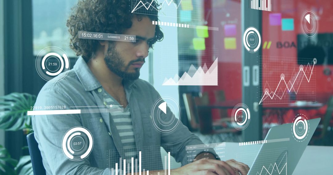 Innovative Professional Using Laptop with Overlayed Data Charts