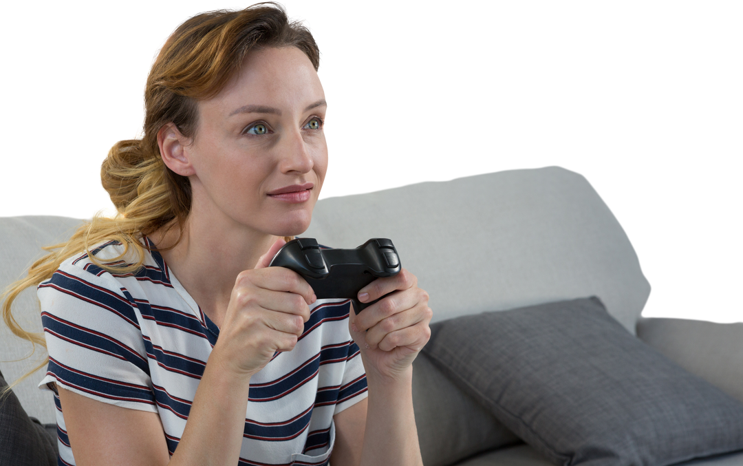 Young Woman Showing Focus While Playing Video Game on Sofa with Transparency - Download Free Stock Images Pikwizard.com