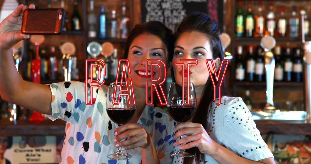 Friends Enjoying Wine and Capturing Memories at Party