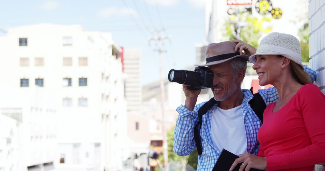 Mature Couple Enjoying Urban Exploration on a Sunny Day
