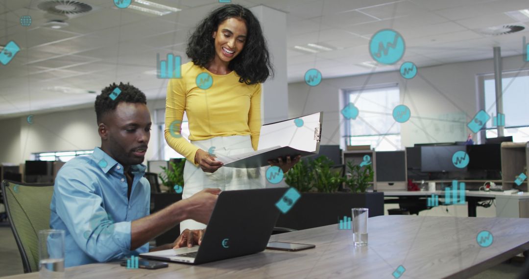 Diverse Team Collaborating on Business Data Solutions in Modern Office