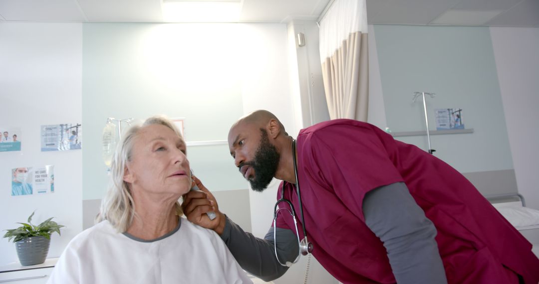 Doctor Examining Elderly Female Patient in Hospital - Free Images, Stock Photos and Pictures on Pikwizard.com