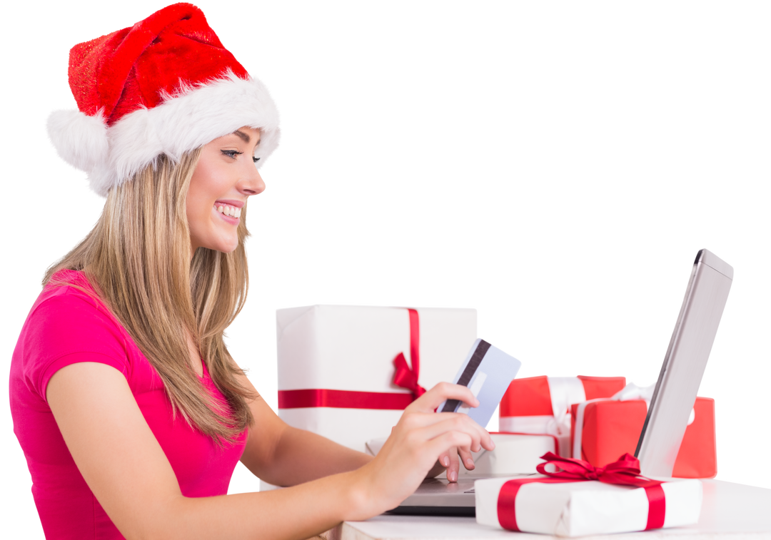 Festive Woman in Santa Hat Shopping Online with Laptop and Gifts - Download Free Stock Images Pikwizard.com