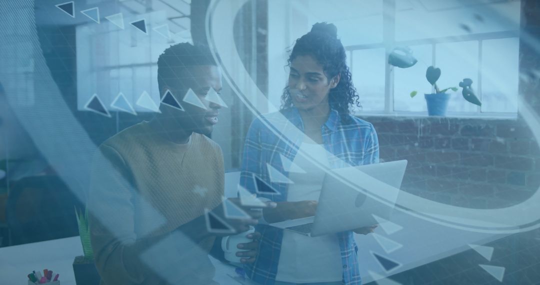 Colleagues Collaborating with Holographic Technology in Modern Office