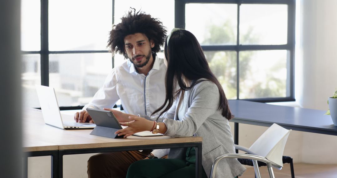 Colleagues Meeting Collaborating in Modern Office Setting
