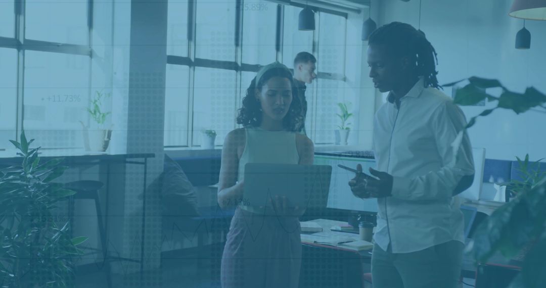 Team Collaboration Discussing Ideas in Modern Office