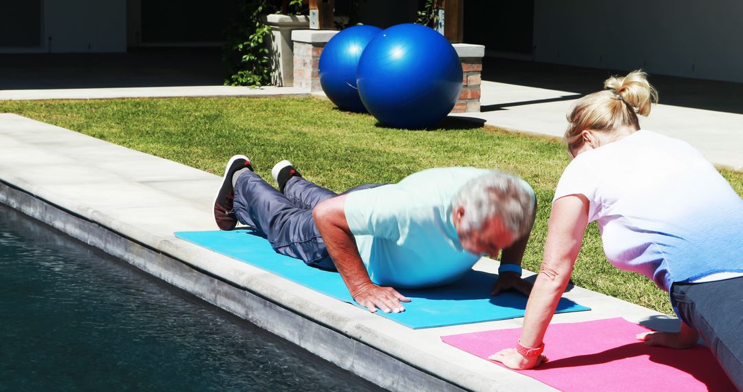 Senior Fitness Routine by Pool with Personal Trainer Assistance