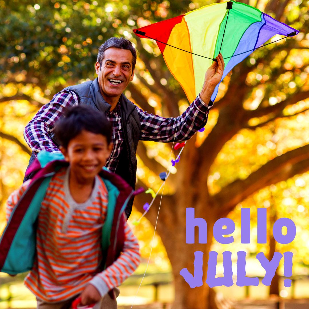 Grandfather and Boy Enjoy Summer Kite Flying in Sunny Park