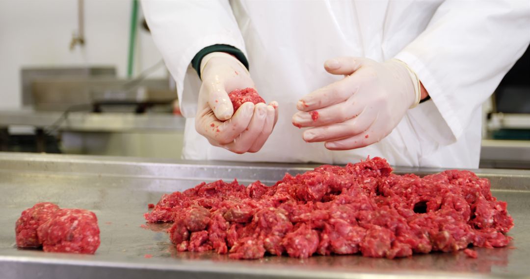 Butcher Skillfully Forming Meatballs from Fresh Minced Meat