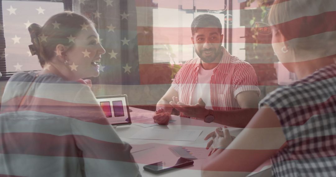 Diverse Team Collaborating in Office with American Flag Overlay