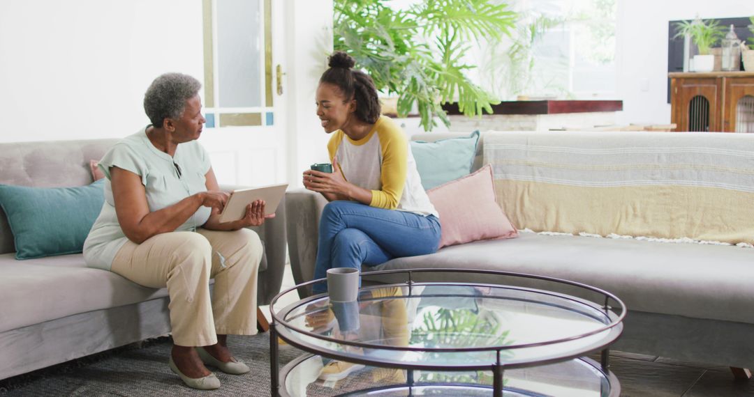 Intergenerational Conversation in Cozy Living Room - Free Images, Stock Photos and Pictures on Pikwizard.com