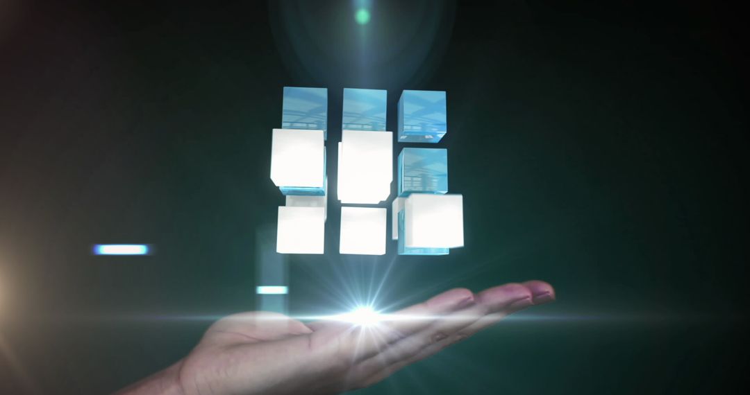 Hand Holding Futuristic Holographic Cubes with Light Effects