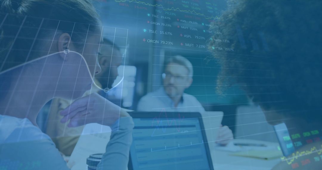 Diverse Team Collaborating on Financial Strategies in Modern Office