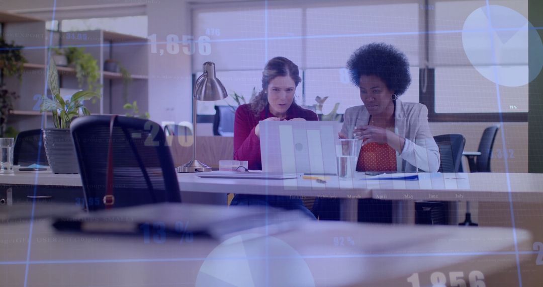 Colleagues Analyzing Financial Data in Office with Overlays