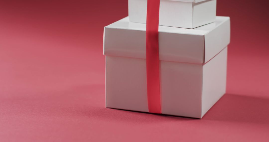 Elegant Gift Boxes with Red Ribbon for Celebrations