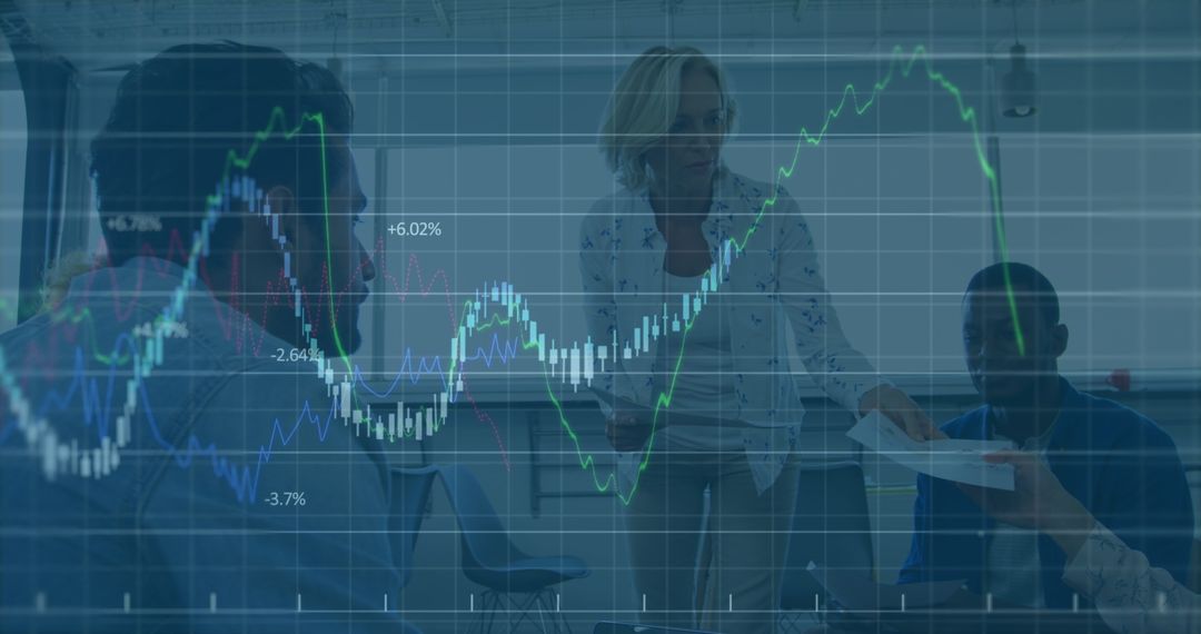 Analysts Examining Financial Growth Data in Modern Office Setting