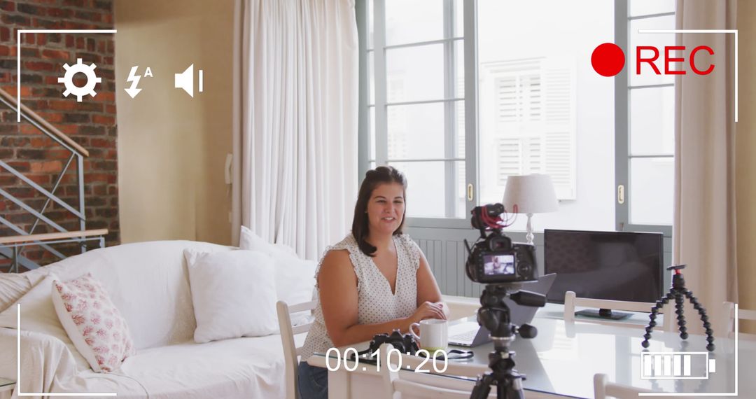 Female Vlogger Recording Content at Home