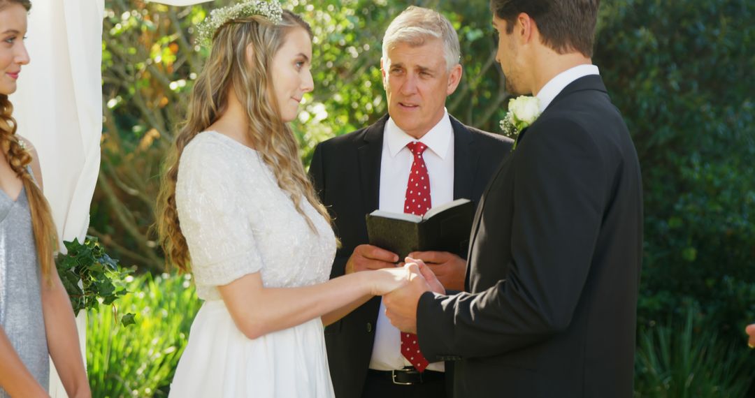 Couple Exchanging Vows at Outdoor Wedding Ceremony - Free Images, Stock Photos and Pictures on Pikwizard.com