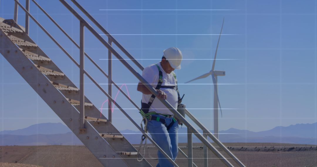Engineer Analyzing Data Amidst Wind Turbine Technology