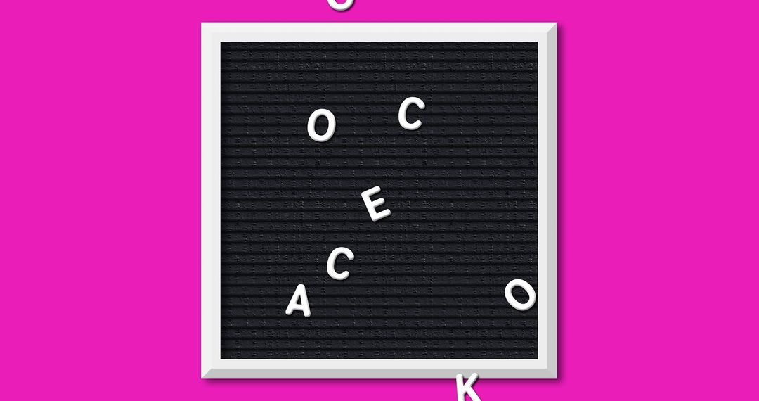 Scattered Letters on Black Board with Vibrant Pink Background