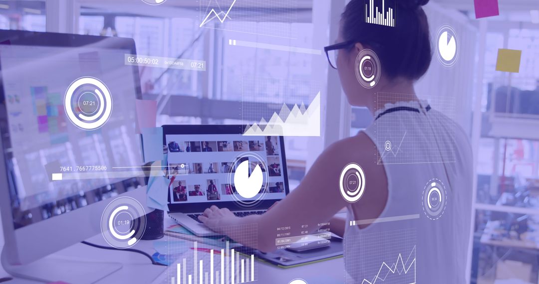 Young Professional Analyzing Data with Charts on Computer Monitors - Free Images, Stock Photos and Pictures on Pikwizard.com