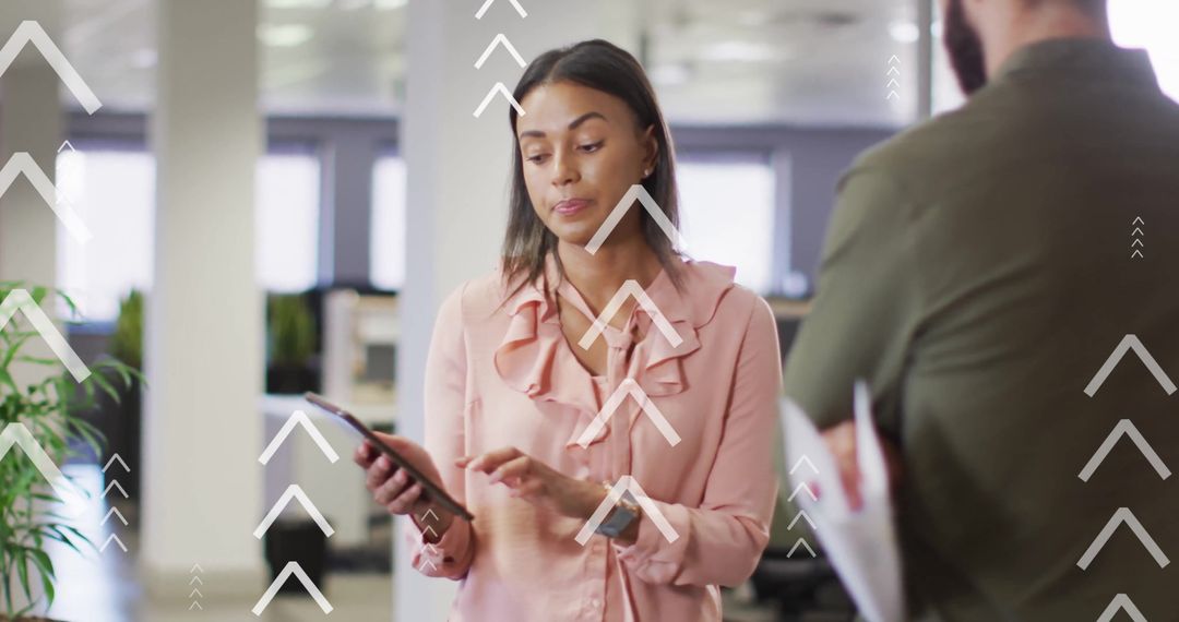 Business Professionals Analyzing Data with Digital Graphics Interface