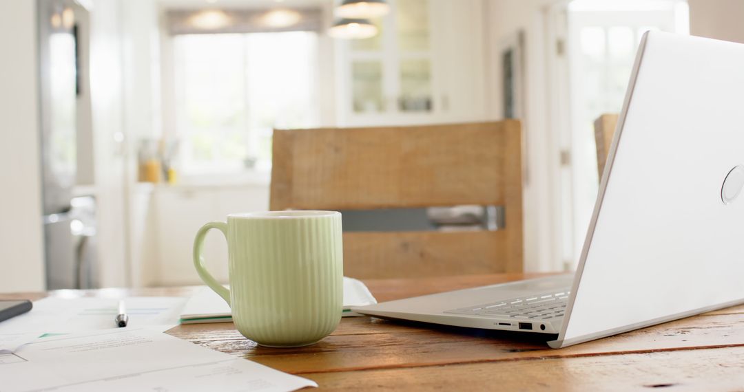 Cozy Home Workspace with Laptop and Coffee - Free Images, Stock Photos and Pictures on Pikwizard.com