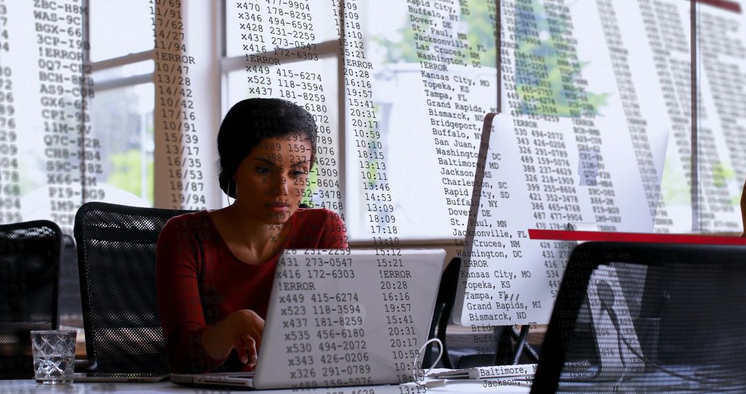 Businesswoman Analyzing Financial Data with Transparency Overlay