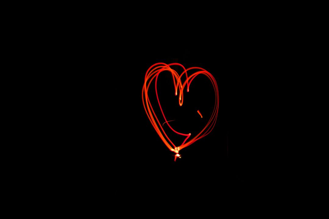 Abstract Light Painting in Heart Shape on Black Background - Free Images, Stock Photos and Pictures on Pikwizard.com