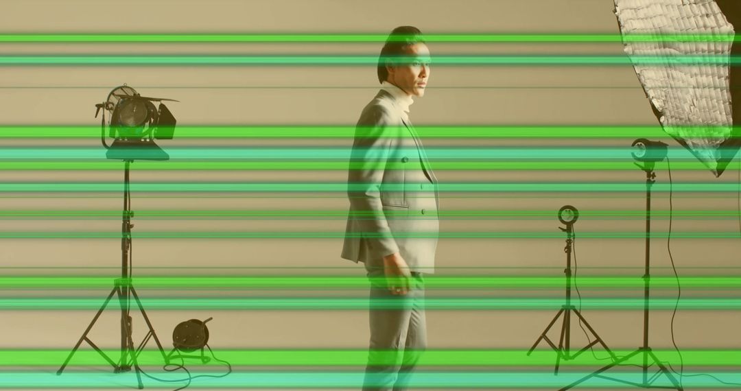 Elegant Model in Suit with Studio Lighting Equipment