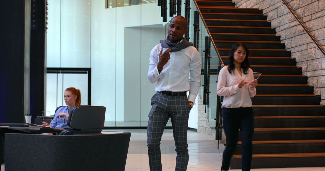 Businessman on Mobile in Contemporary Office Space