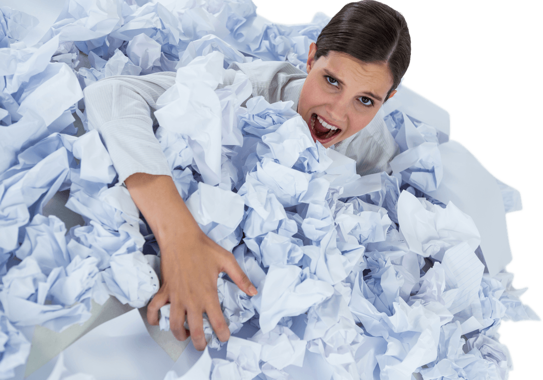 Stressed Businesswoman Overwhelmed in Piles of Crumpled Papers