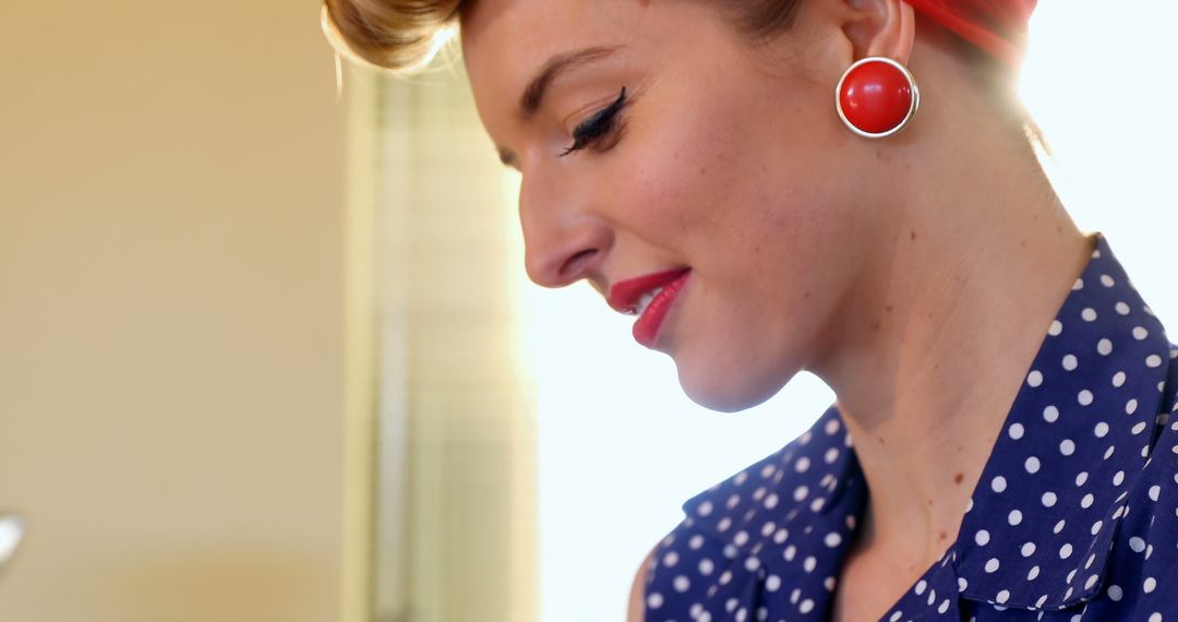 Retro Woman in Polka Dot Dress with Red Earrings - Free Images, Stock Photos and Pictures on Pikwizard.com