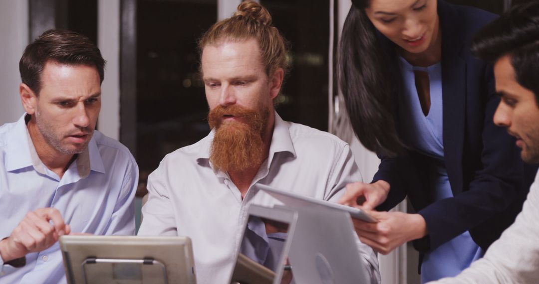 Diverse Team Collaborating in Serious Business Discussion