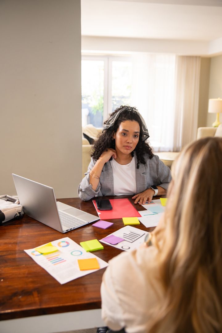 Modern Workspace Collaboration with Diverse Female Colleagues