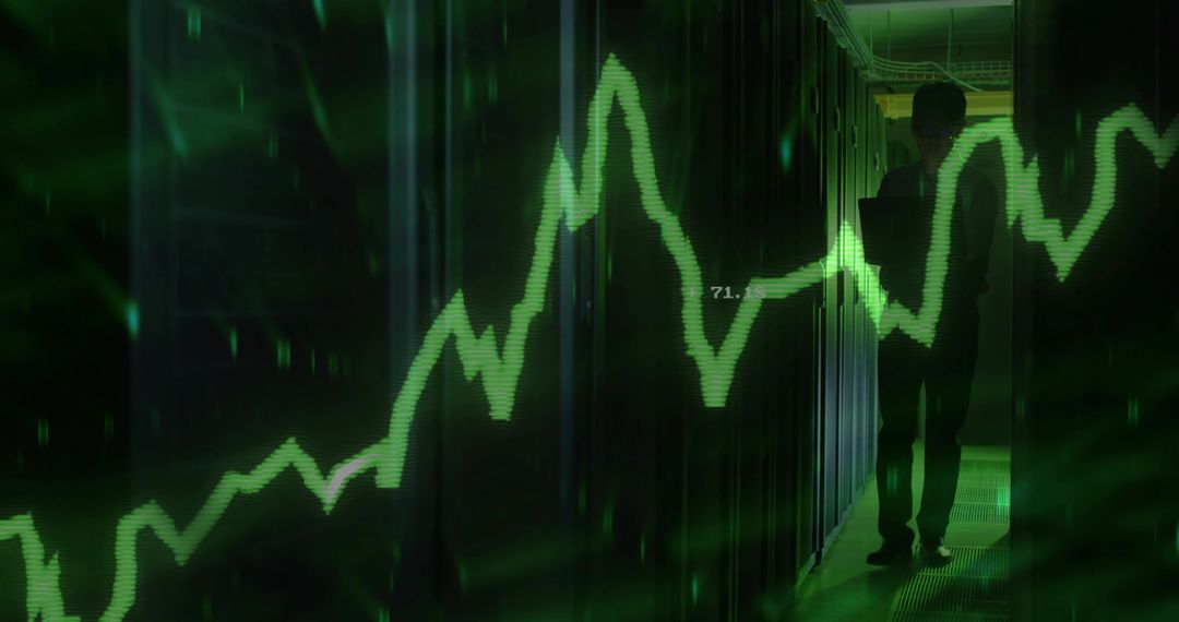 IT technician monitoring server racks with green waveform overlay in datacenter corridor