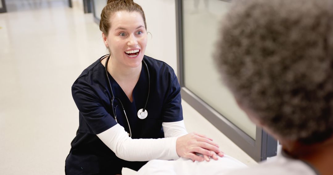 Cheerful Nurse Engaging with Elderly Patient - Free Images, Stock Photos and Pictures on Pikwizard.com