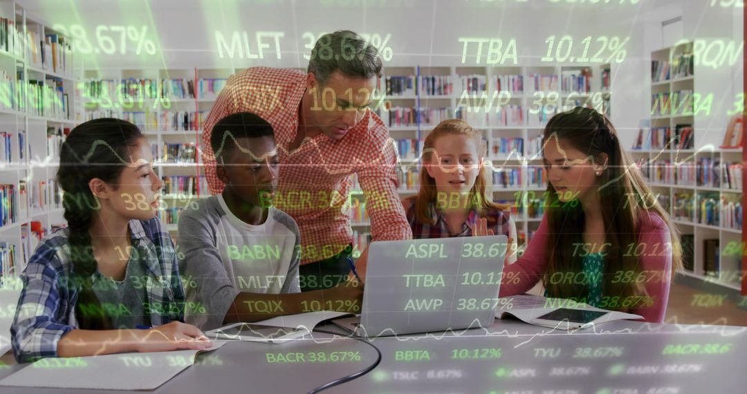 Mature teacher guiding diverse students using laptop with financial data overlay in library