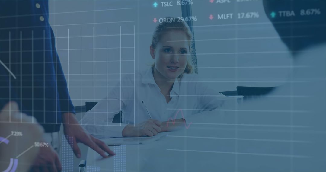 Business Team in Meeting with Stock Market Projection Overlay