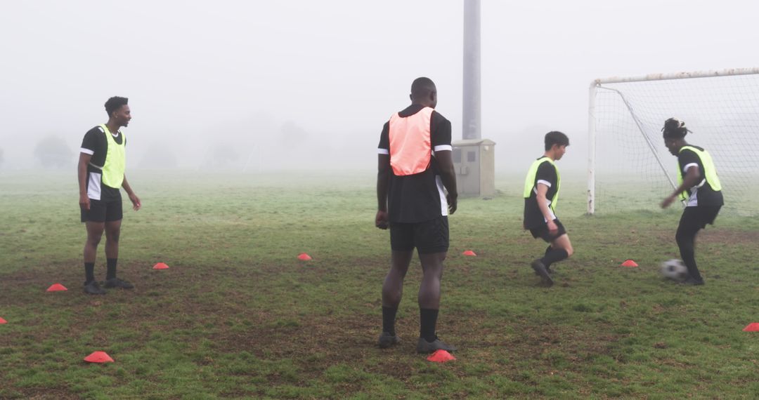 Diverse Soccer Practice on Foggy Field with Dynamic Dribbling
