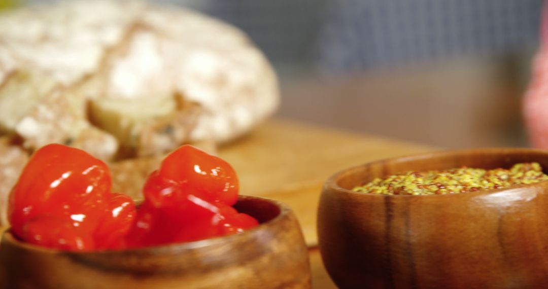 Close-Up of Fresh Red Peppers and Seasoning in Wooden Bowls - Free Images, Stock Photos and Pictures on Pikwizard.com