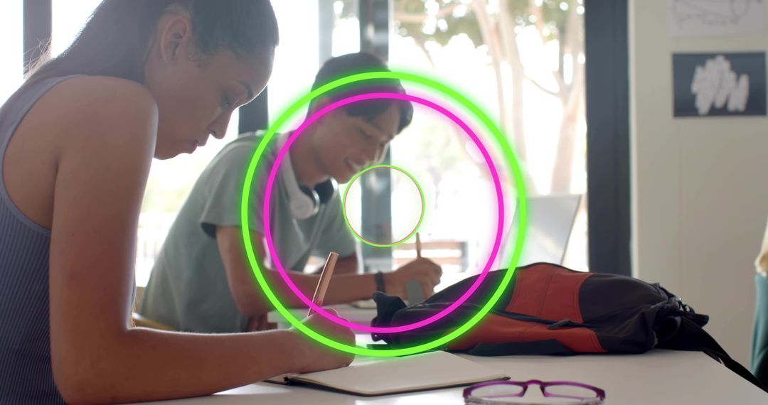 High School Students Writing and Concentrating at Bright Desk with Neon Circle Overlay