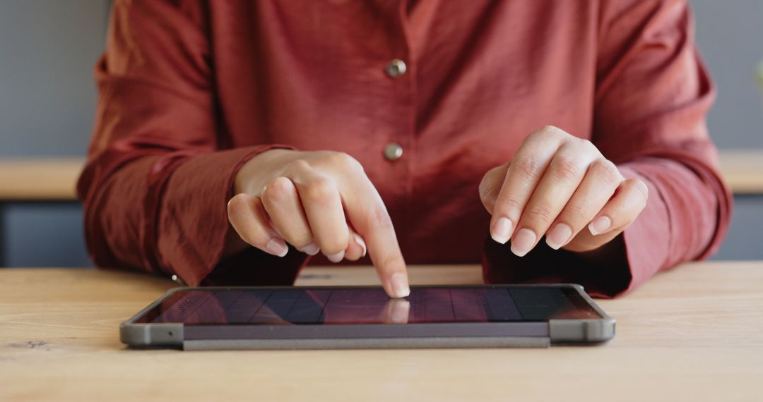 Hands Typing on Tablet for Digital Communication at Office Workspace