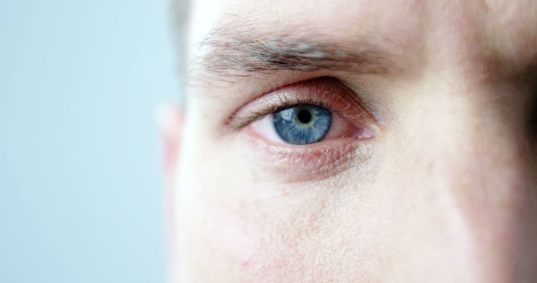 Close-up of Man's Blue Eye with Detailed Iris - Free Images, Stock Photos and Pictures on Pikwizard.com