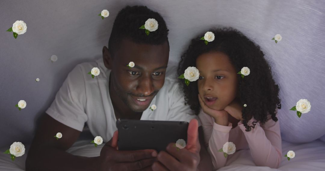 Father Daughter Bonding with Tablet Surrounded by Roses