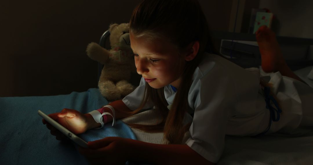 Young Girl in Hospital Bed Using Smartphone at Night - Free Images, Stock Photos and Pictures on Pikwizard.com