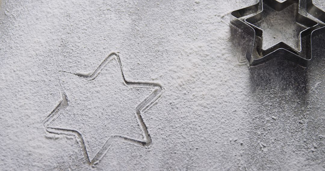 Sugar star cookie cutter on flour dusted surface - Free Images, Stock Photos and Pictures on Pikwizard.com